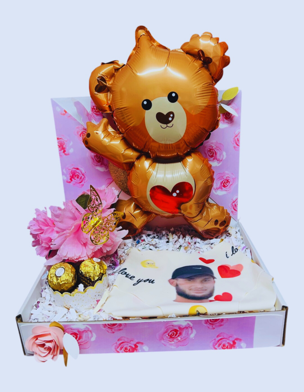 A personalized gift set featuring custom-printed panties, gourmet chocolate, and a cute teddy bear—perfect for a romantic surprise